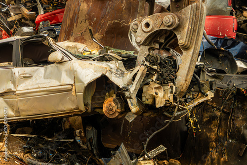 A vehicle dismantling system (VDS) removes engine and wire parts from a wrecked car.