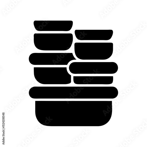Stack of black bowls and containers in a larger container