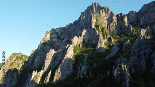 Movement in the mountainous landscape at sunset 