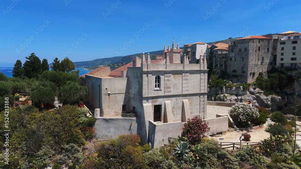 Obraz premium Aerial view of Santa Maria dell'Isola sanctuary on a rocky islet and the old town of Tropea with Tyrrhenian Sea in the background, Calabria, Southern Italy