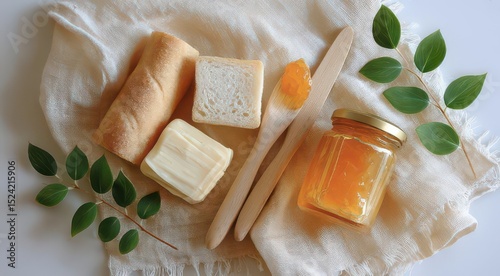 Fresh Bread and Honey Spread on a Soft Cloth