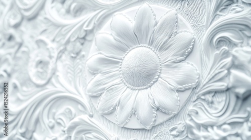 A pile of decorative silver coins featuring intricate floral engravings arranged in a visually appealing manner.