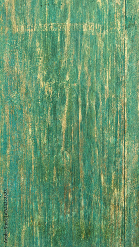 Wooden surface with a rustic teal and gold textured finish, displaying natural grain