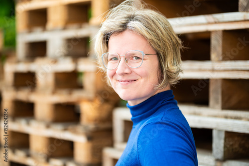 Casual portrait of a 39 yo white woman with a blue shirt, Koekelberg, Belgium