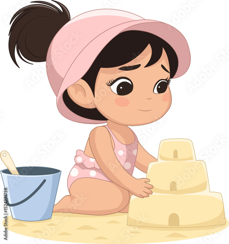 Girl builds sand castle