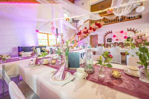 Wedding decor. Close up of a wedding table decoration with white and pink flowers and candles Wedding floristic concept