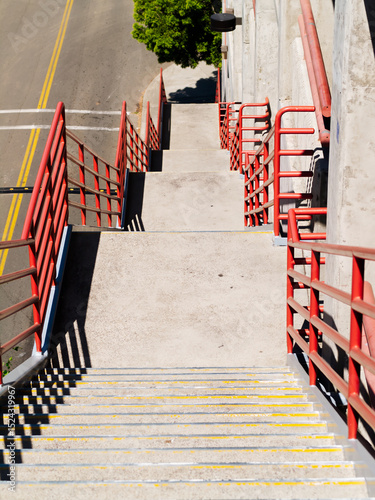 Looking Down On Outdoors Cement Stairs On Parking Garage