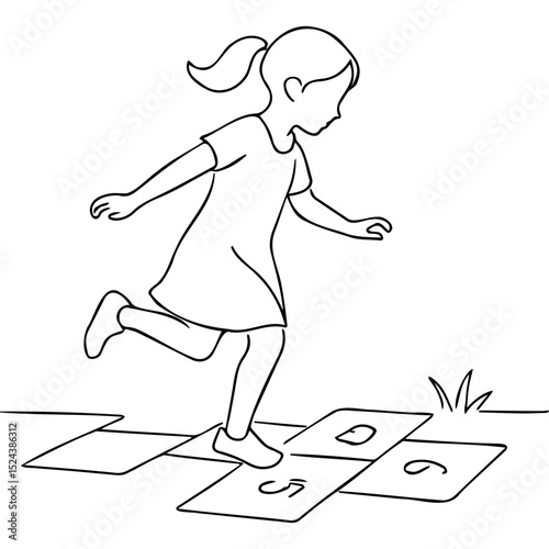 Young girl jumping on hopscotch squares in a driveway outdoors  
