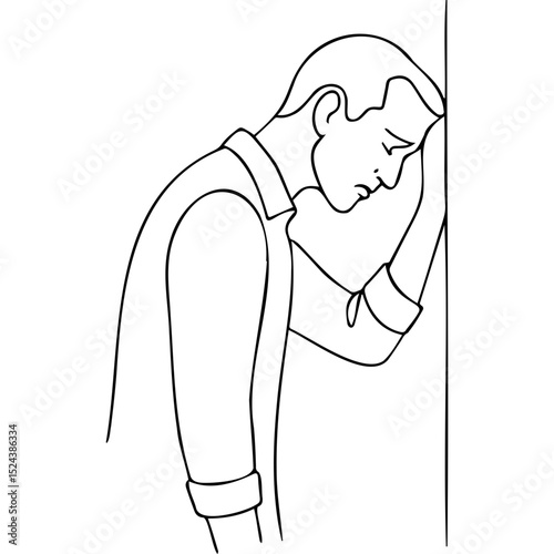 Man leaning against wall with head down in a moment of sadness  