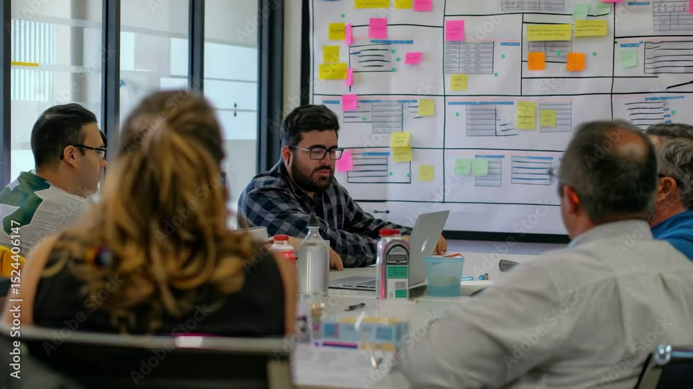 Collaborative brainstorming session in modern office with diverse group working on creative project ideas and strategies
