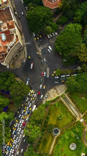 sunny day bangalore city park traffic street crossroad aerial vertical panorama tlmelapse 4k india