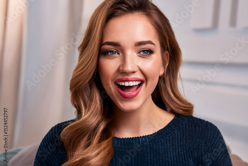  young charming girl is laughing sincerely