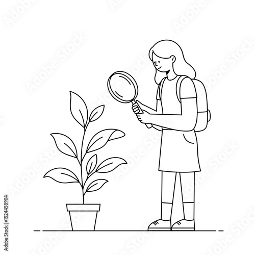 Curious schoolgirl examining plant with magnifying glass in science exploration