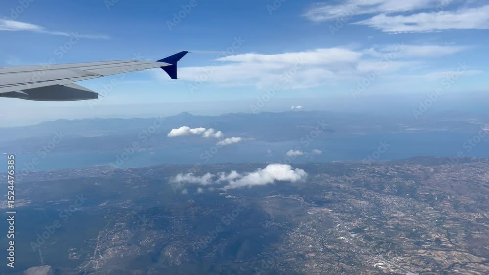 Plane window perspective ocean mountains cities Plane window perspective ocean mountains cities