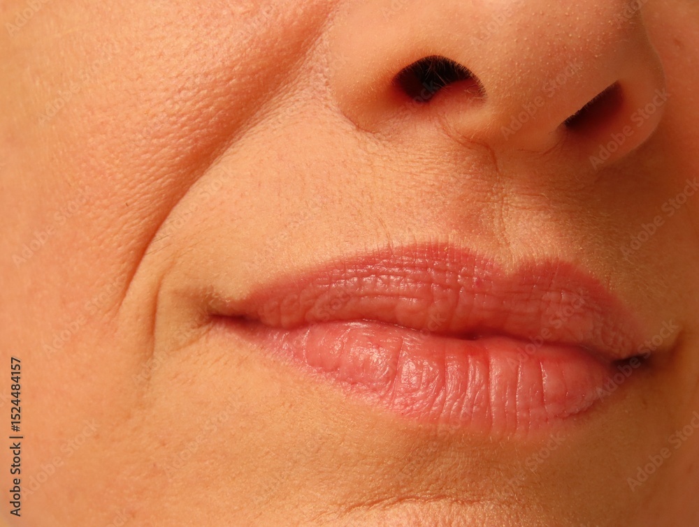 Obraz premium Closeup of woman face. Woman in her forties face.