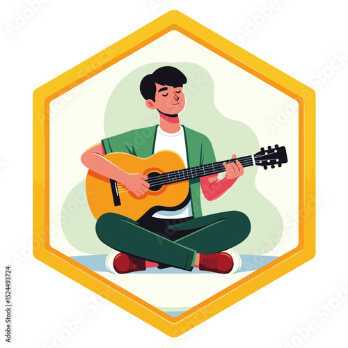 Young man sitting cross-legged and playing guitar joyfully against a soft green background, creativity concept of music cafes or art studios