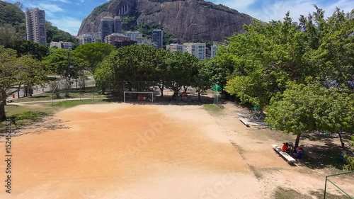 view of the dirt football pitch at Lagoa Rodrigo de Freitas in Rio de Janeiro.