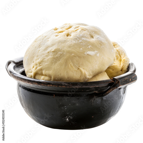 Freshly prepared dough sits in rustic bowl, showcasing its soft and pliable texture, perfect for baking. This evokes sense of warmth and culinary creativity