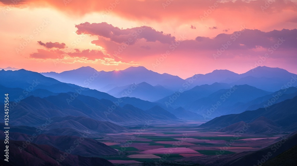 Obraz premium Sunset Hues Overlayered Mountain Ranges Valley Landscape