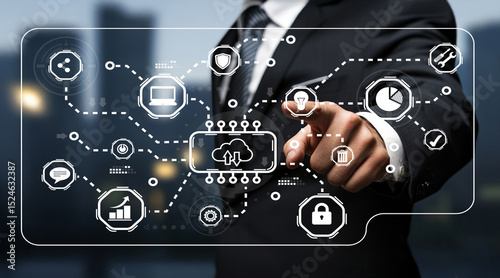 Business professional interacting with futuristic digital interface showcasing technology graphics and data visualization concepts in modern office environment