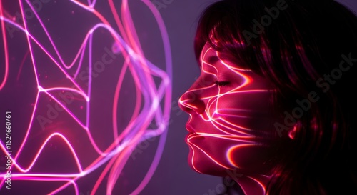 Abstract Futuristic Portrait: Woman's Face Illuminated by Neon Light Patterns