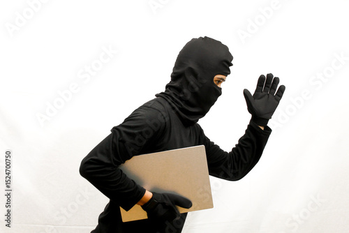 thief stealing laptop computer isolated white background .criminal concept