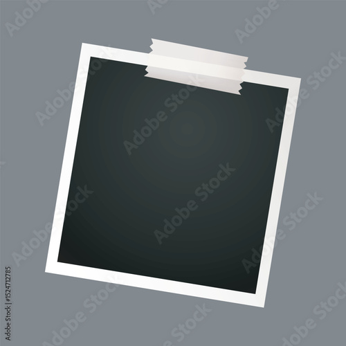 blank photo frame with tape 