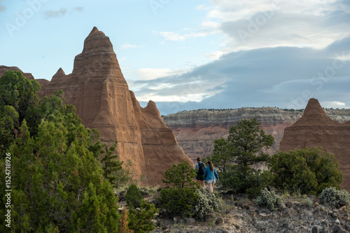 Two Woman Hike Along the Cathedral Valley Formations