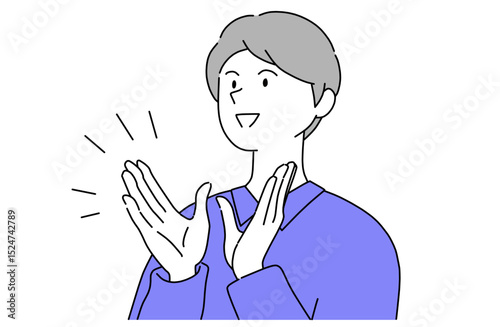 拍手で称賛を伝える笑顔の若い男性