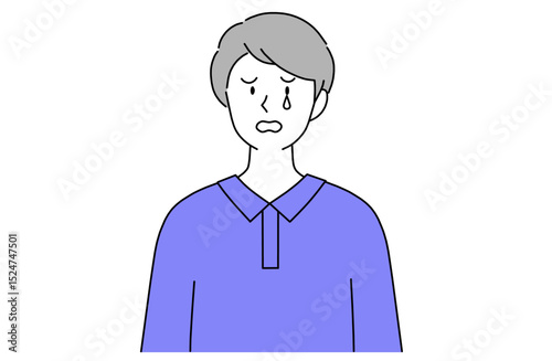 涙を流しながら悲しそうな表情をする若い男性
