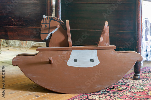 Old rocking horse in a historic room