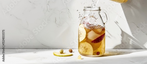 Vibrant kombucha bottle with fruit slices and dynamic splash showcasing freshness