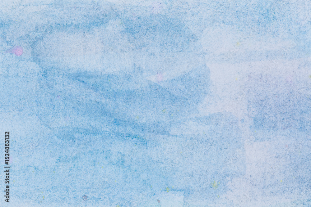 Obraz premium Macro close-up of hand painted light blue watercolor background with watercolour stains and brush strokes. High resolution full frame textured paper background with copy space.