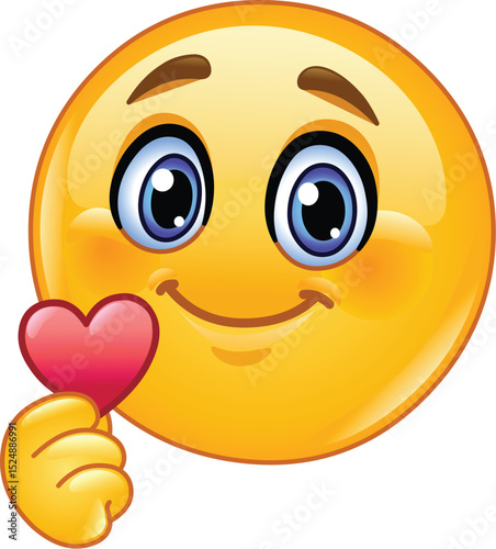 Cute Emoji Emoticon Holding a Small Heart in Its Hand