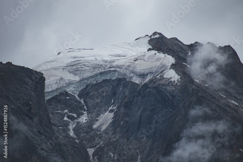 Snowcapped mountains on a cloudy day