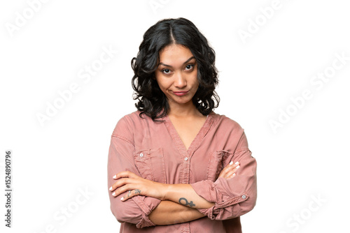 Young Argentinian woman over isolated background feeling upset photo
