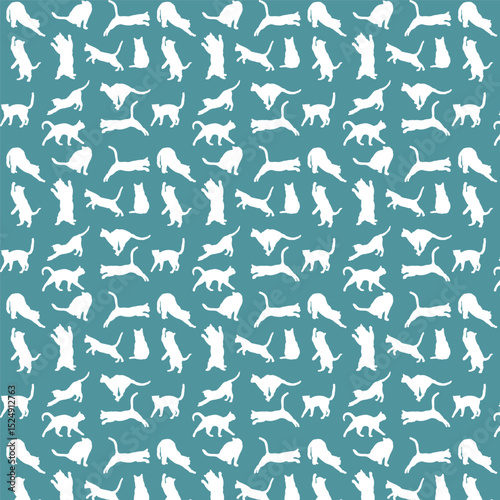 Seamless pattern with cats,White cats in different poses on blue background.