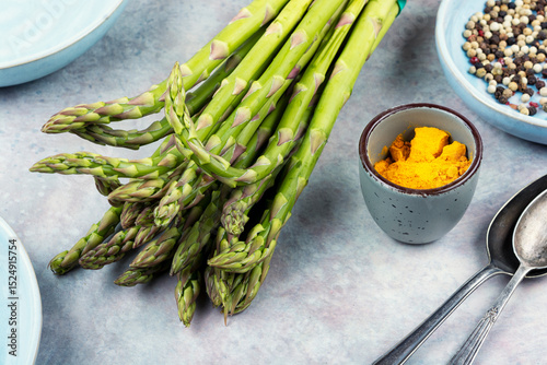 Delicious raw green asparagus.
