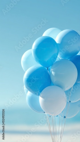 Balloons in Shades of Blue Floating Against a Clear Sky During Daylight Hours