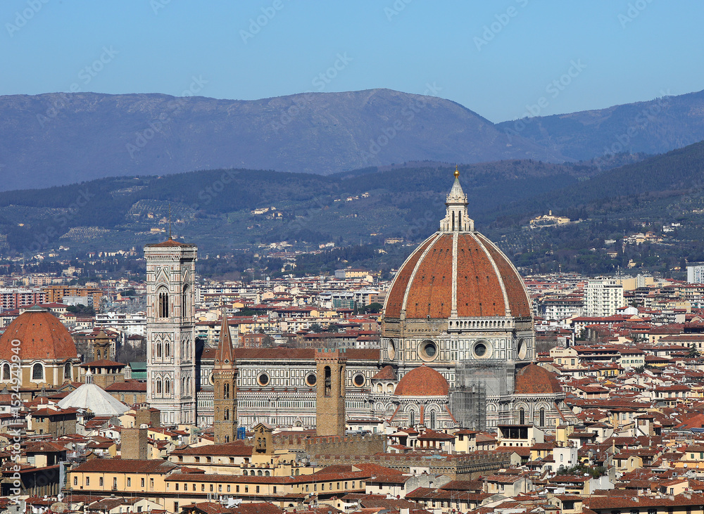 Obraz premium view of florence duomo in central italy with famous giotto bell tower and brunelleschi designed dome and apennine hills in background