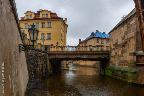 The river Čertovka in the center of the capital of the Czech Republic, Prague, on a cloudy spring day