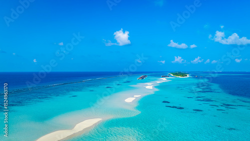Aerial view in the island with white sand beach as coastline in summer Maldives