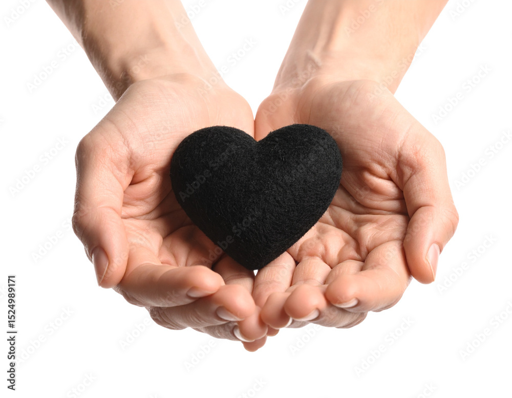 Obraz premium Black Soft Heart Cradled Gently in Two Human Palms, isolated on white background