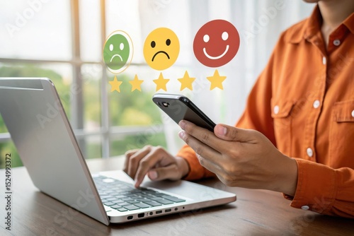Customer feedback on laptop with rating emoticons