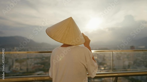 Enjoy the mesmerizing view of a serene sunset coupled with a traditional Asian hat