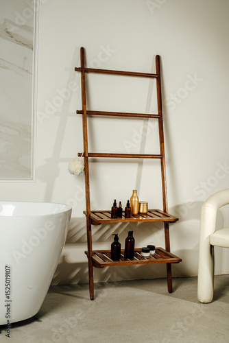 Stylish bathroom. Bathtub, shelf, chair.