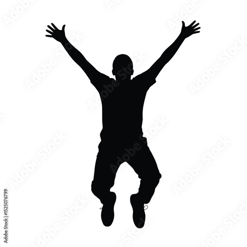 Silhouette of a man jumping with arms raised in celebration and excitement
