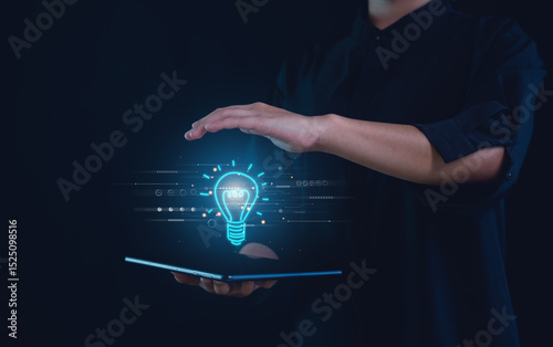Hand of  holding illuminated light bulb, Idea innovation and inspiration concept.  creativity with bulbs that shine glitter, Concept for success.