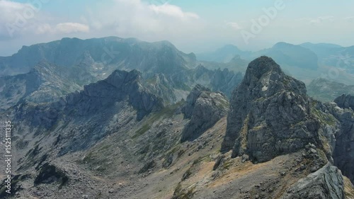 Flying in Durmitor mountains. Durmitor National park in Montenegro. Beautiful aerial mountain landscape, 4k