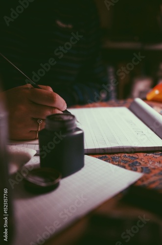 man practicing calligraphy 